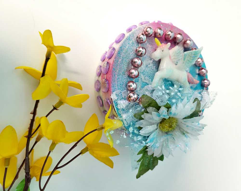 Recycled Round Jewelry Box with a Flying Pink Unicorn and a Daisy