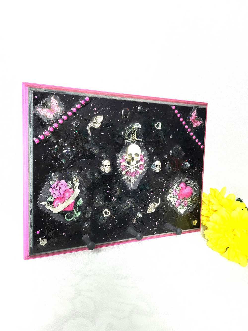 Black Goth Wall Plaque with a Skull with a Sword, Glass and Pink Butterflies