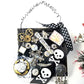 Skull & Bones Wall Plaque in Black & Gold, with Curly Wire Ribbon "No Regrets"