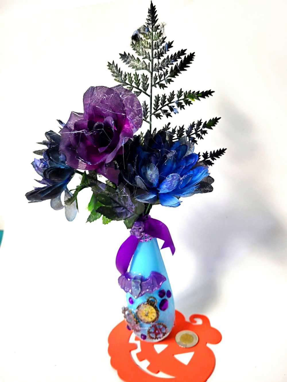 Teal Glass Vase with Skull, Purple Rose and Gears