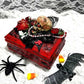 Small Red and Black Jewelry Box with a Skull and a Red Rose