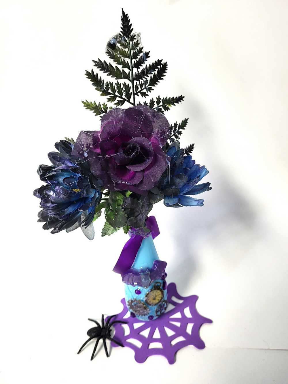 Teal Glass Vase with Skull, Purple Rose and Gears